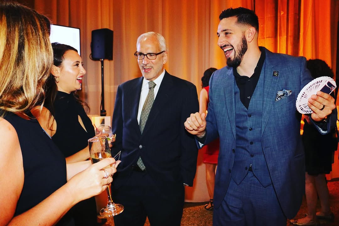 Daniel Nicholas performing at cocktail reception